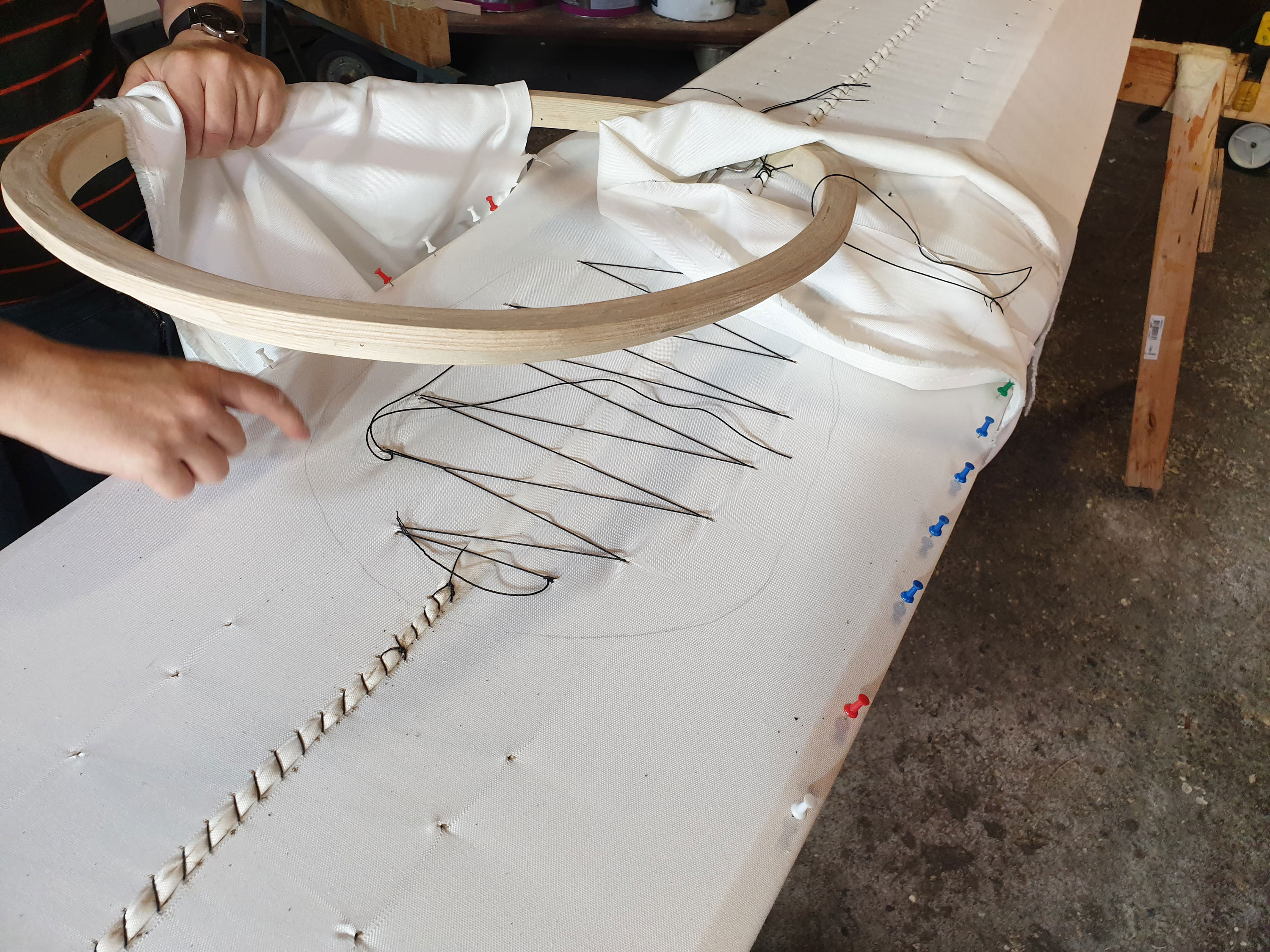 Pencil marked, zig-zag tensioned, pins keeping tight and coaming is non-detachable in the front