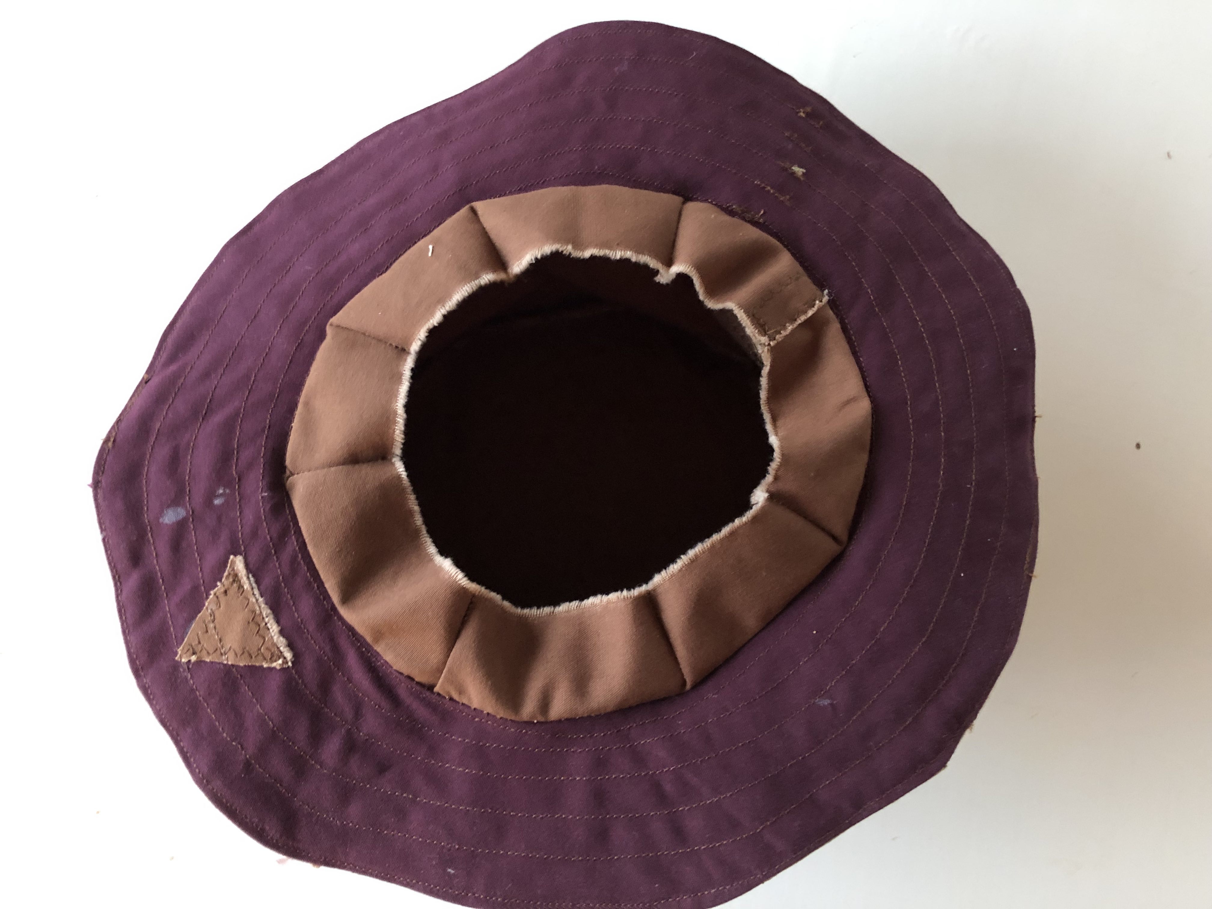 ...or you can decide on a slightly larger hole and sew darts in your liner for a more flexible fit