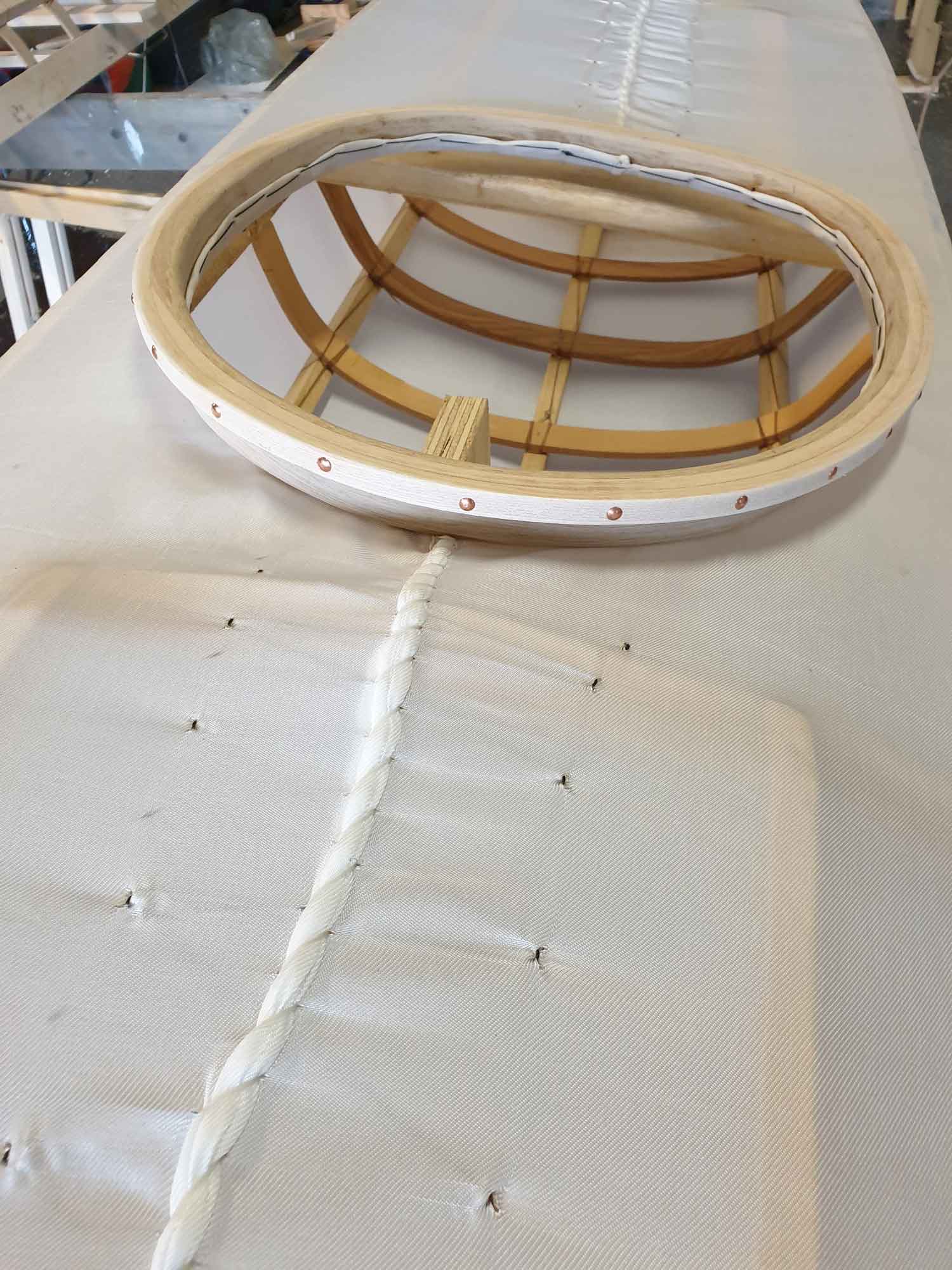 Remember to stretch at all sides of the coaming when sewing