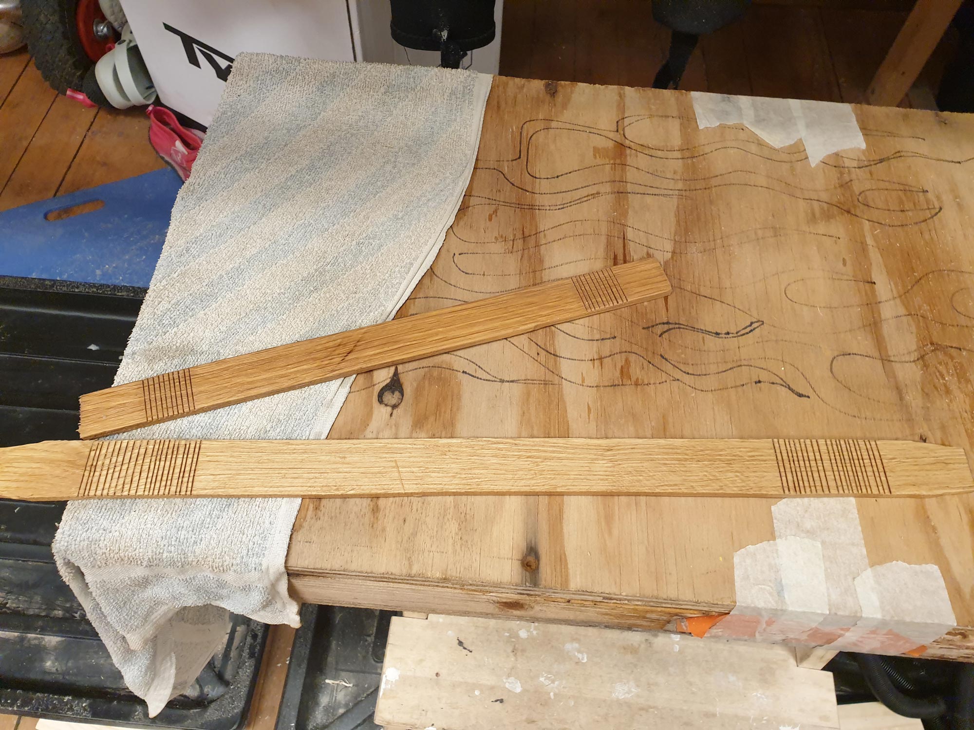 Tried ribs with grooves to control the bend. Kinda worked.