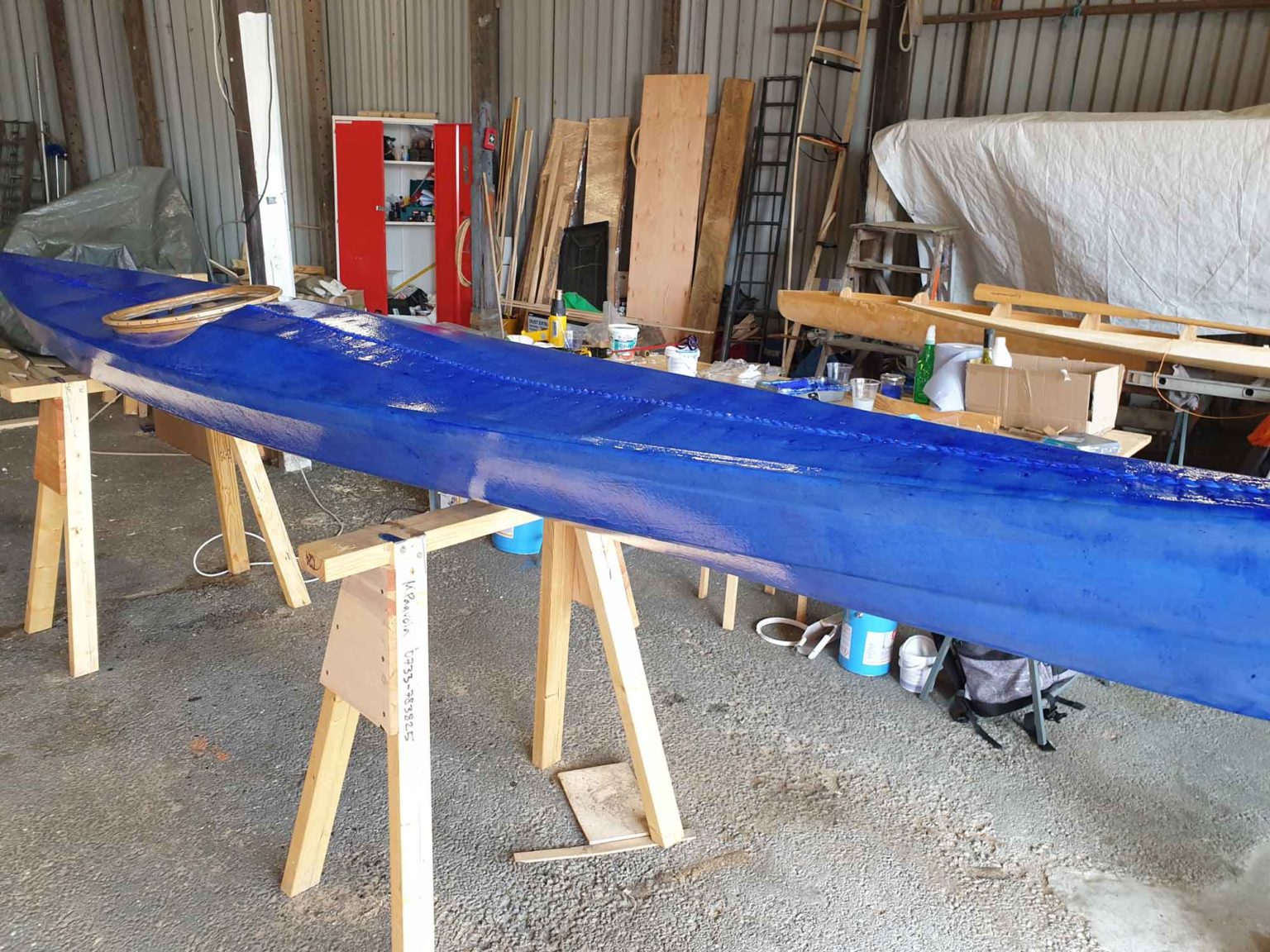 Coating a skin on frame kayak RUGD